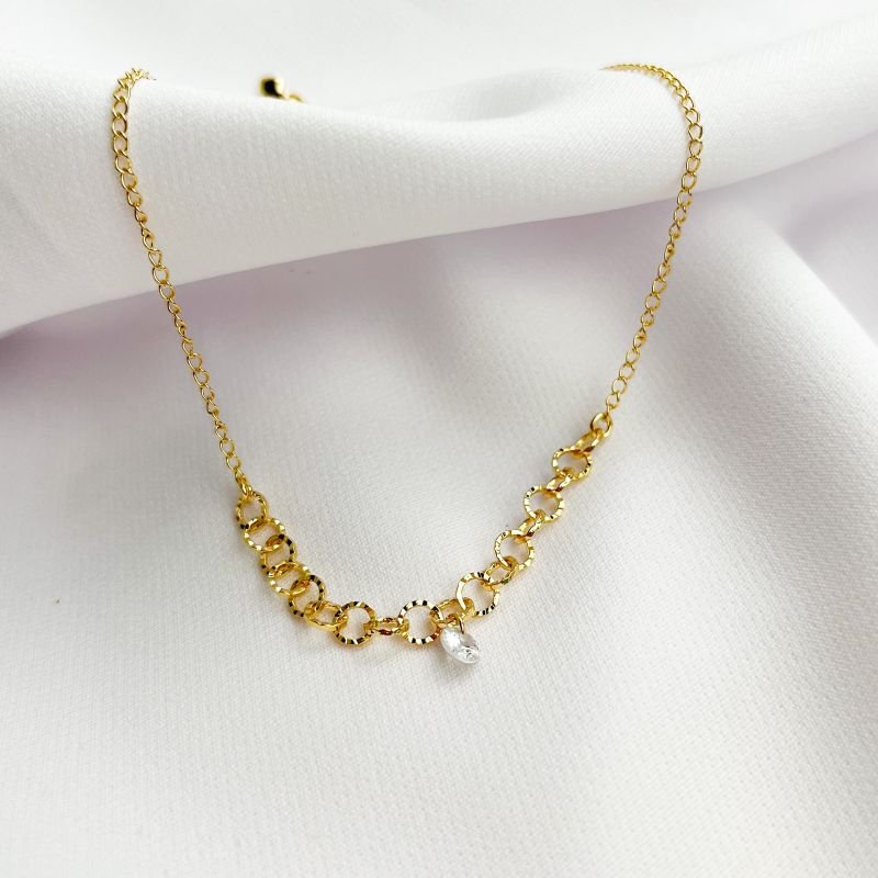 TORNOZELEIRA ELOS COM PONTO DE LUZ PENDURADO EM OURO 18K